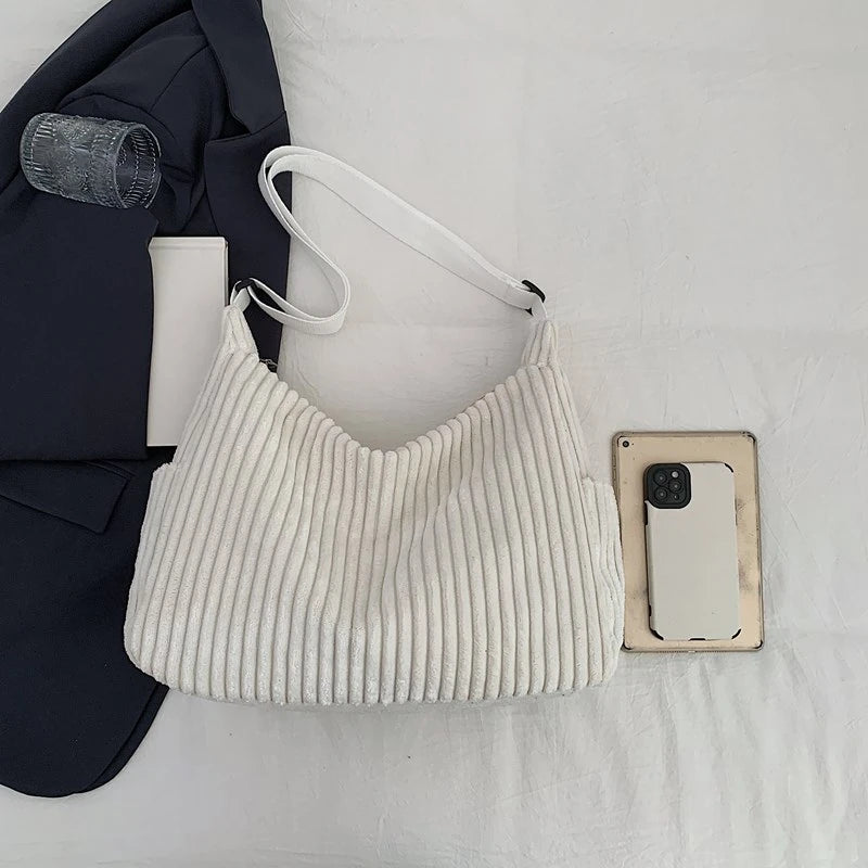 Versatile corduroy handbag with shoulder strap