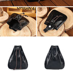Compact drawstring pouch in leather