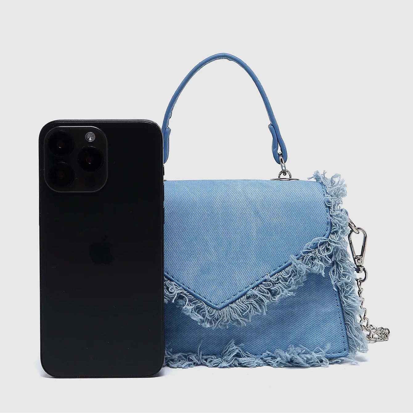 Mini denim handbag with frayed trim