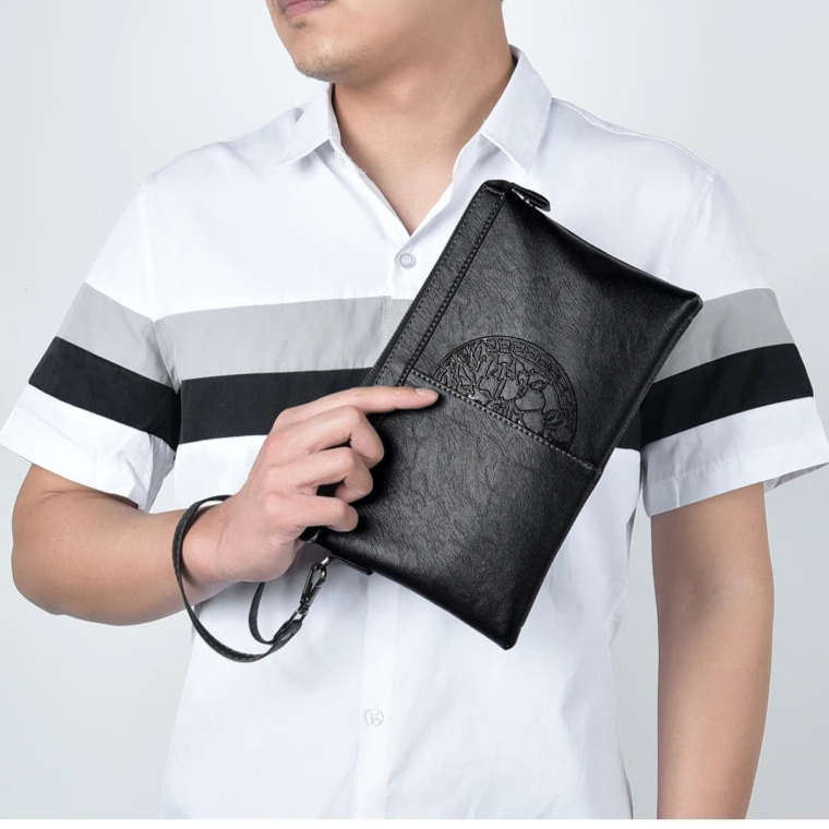 Minimalist leather clutch with detachable strap