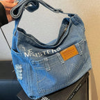Distressed denim tote bag