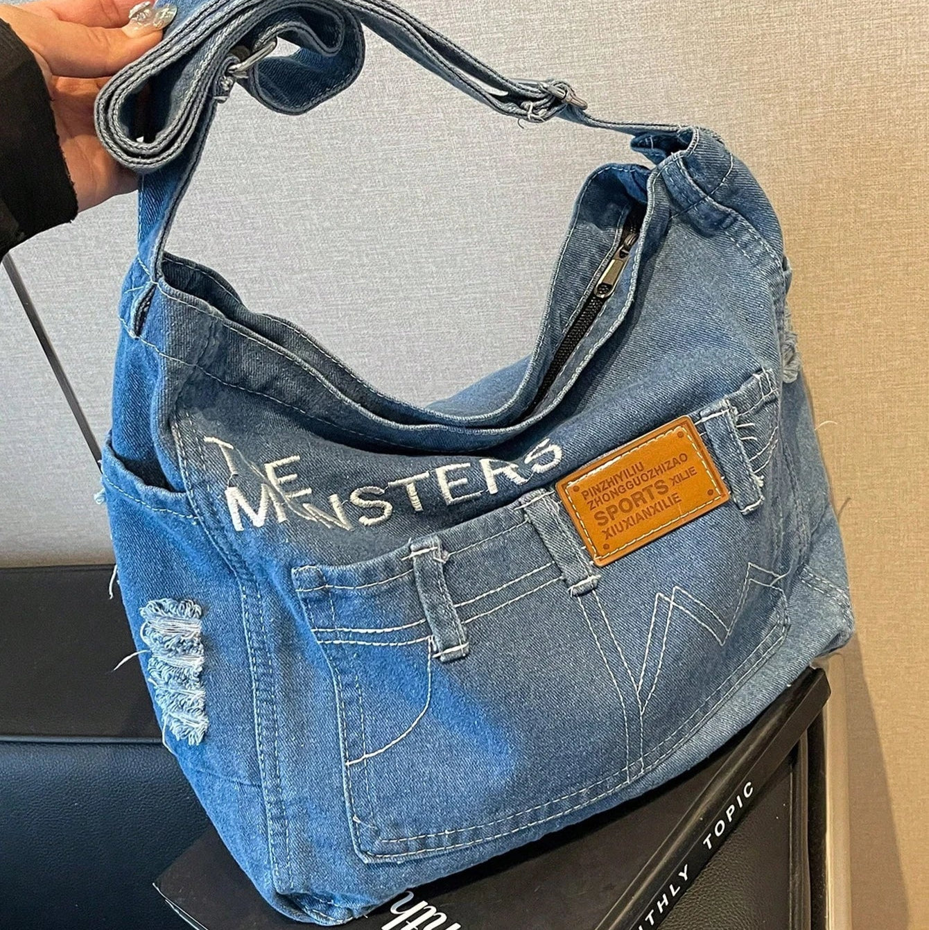 Distressed denim tote bag