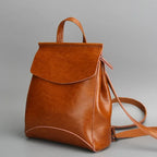 Women’ leather bookbag-style backpack