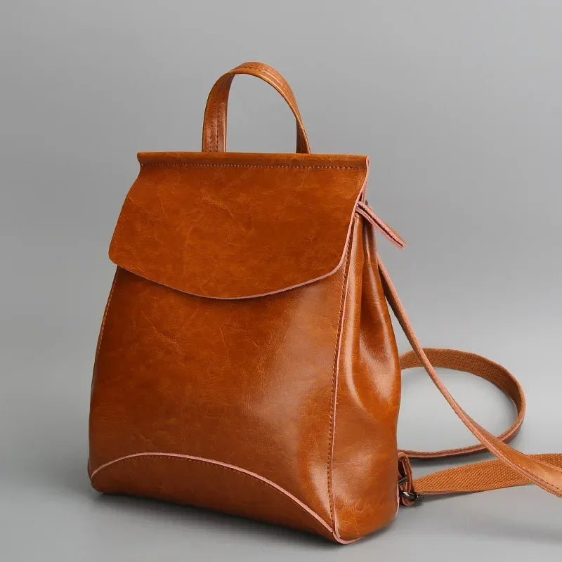 Women’ leather bookbag-style backpack