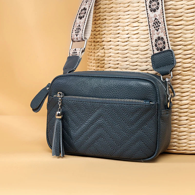 Textured leather crossbody bag