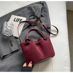 Everyday suede handbag with strap
