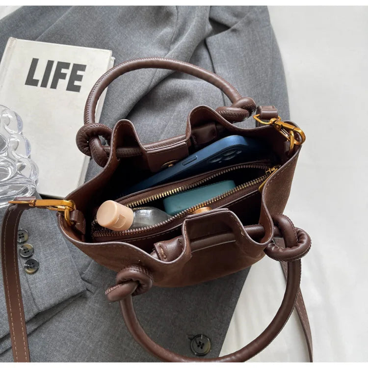 Everyday suede handbag with strap