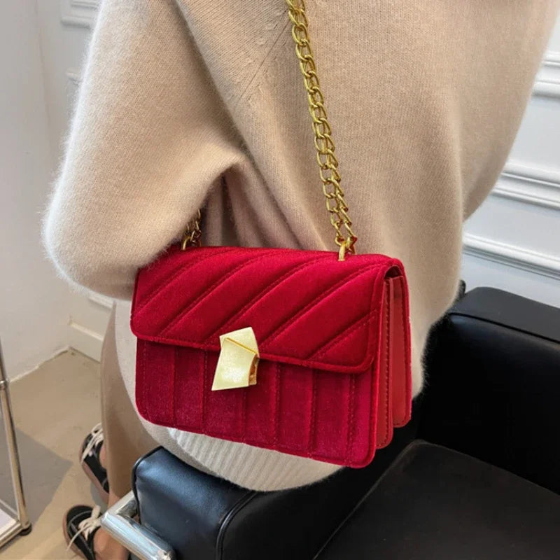 Corduroy handbag with chain and flap closure