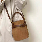 Small brown corduroy handbag with top handle
