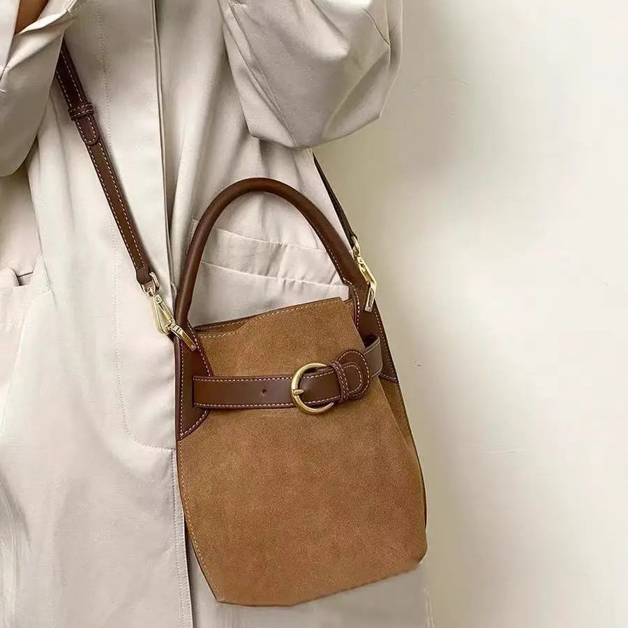 Small brown corduroy handbag with top handle