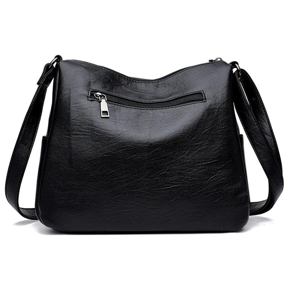 Leather shoulder bag with adjustable strap
