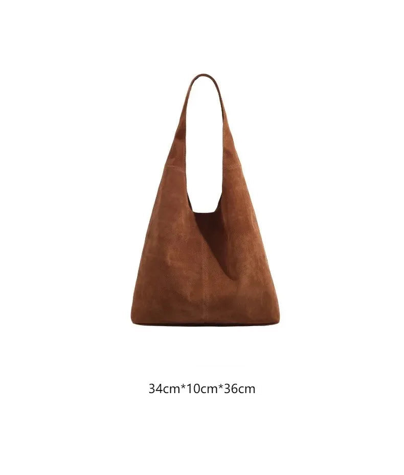 Suede hobo slouch bag with wide handle strap