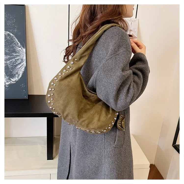 Chic suede shoulder bag with decorative strass