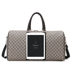 Textured leather travel duffle bag