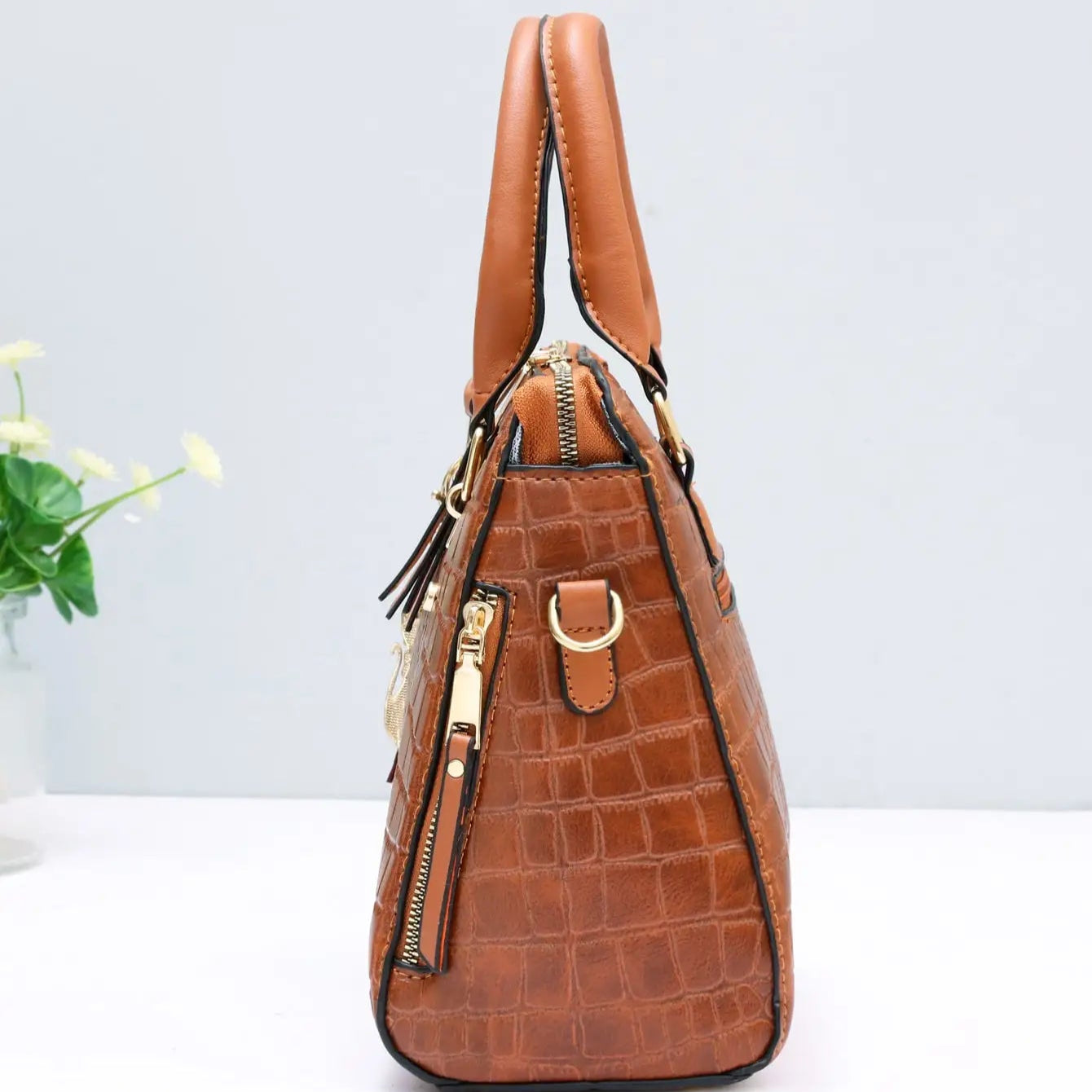 Top-handle leather handbag