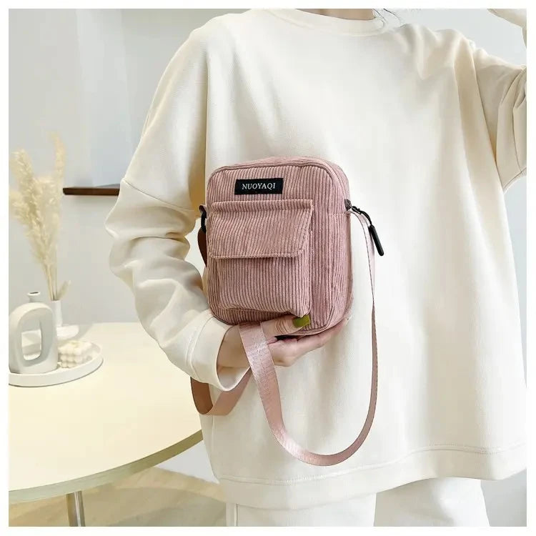 Corduroy crossbody handbag with front pocket