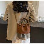 Everyday suede handbag with strap