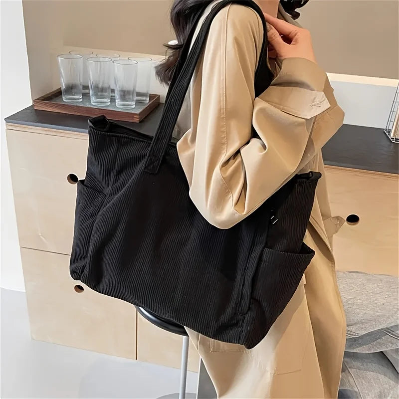 Corduroy tote bag with zipper closure and pockets