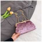 Corduroy evening clutch bag with wrist strap