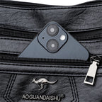 Leather shoulder bag with adjustable strap