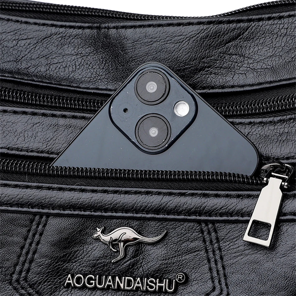 Leather shoulder bag with adjustable strap