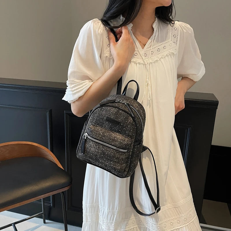 Women's small denim backpack
