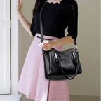 Leather handbag with detachable shoulder strap