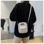 Corduroy crossbody handbag with front pocket