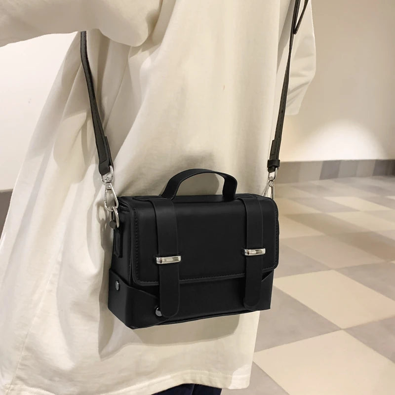 Compact leather crossbody bag
