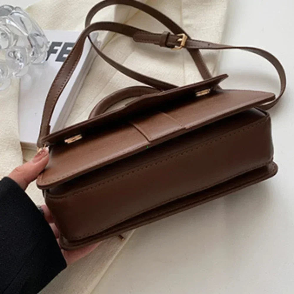 Compact leather sling bag for daily essentials