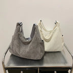 Versatile corduroy handbag with shoulder strap