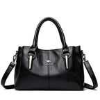 Leather handbag with detachable shoulder strap