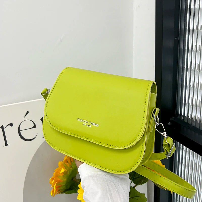 Compact leather sling crossbody
