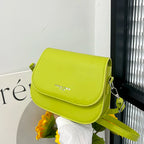Compact leather sling crossbody