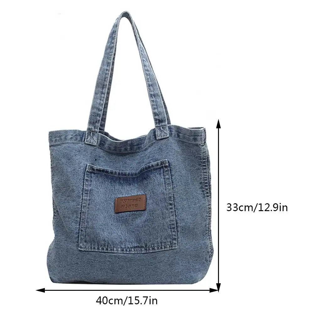 Fashion denim tote bag with leather patch