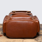 Tall leather rucksack with top flap