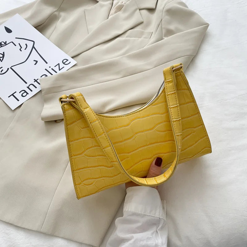 Small leather sling pouch