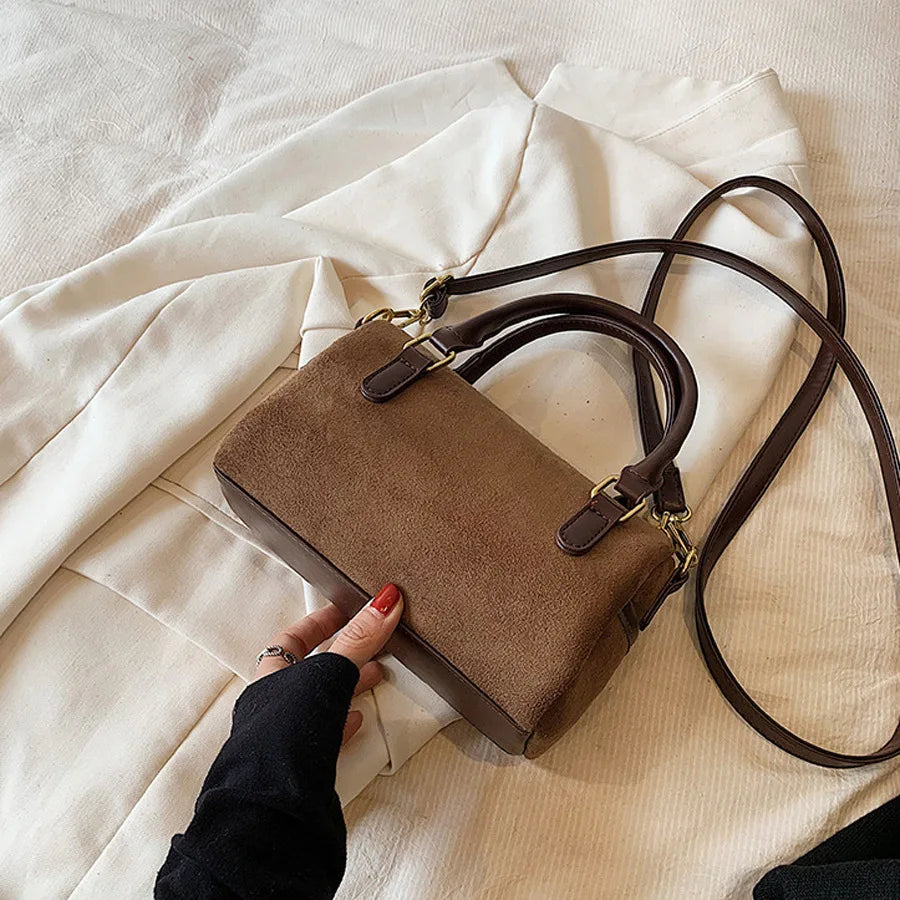 High-end suede purse with structured body