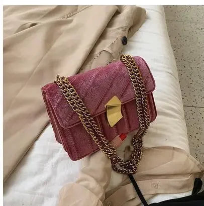 Corduroy handbag with chain and flap closure