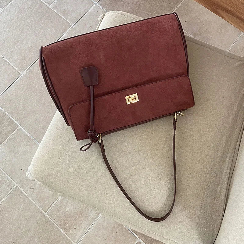 Structured modern suede handbag
