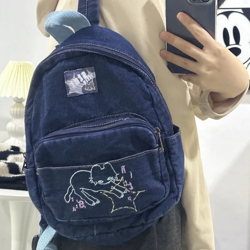 Cat-embroidered denim backpack