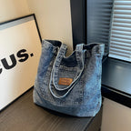 Fashion denim tote bag with leather patch