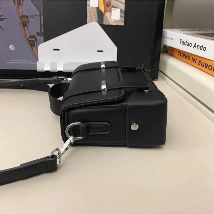 Compact leather crossbody bag