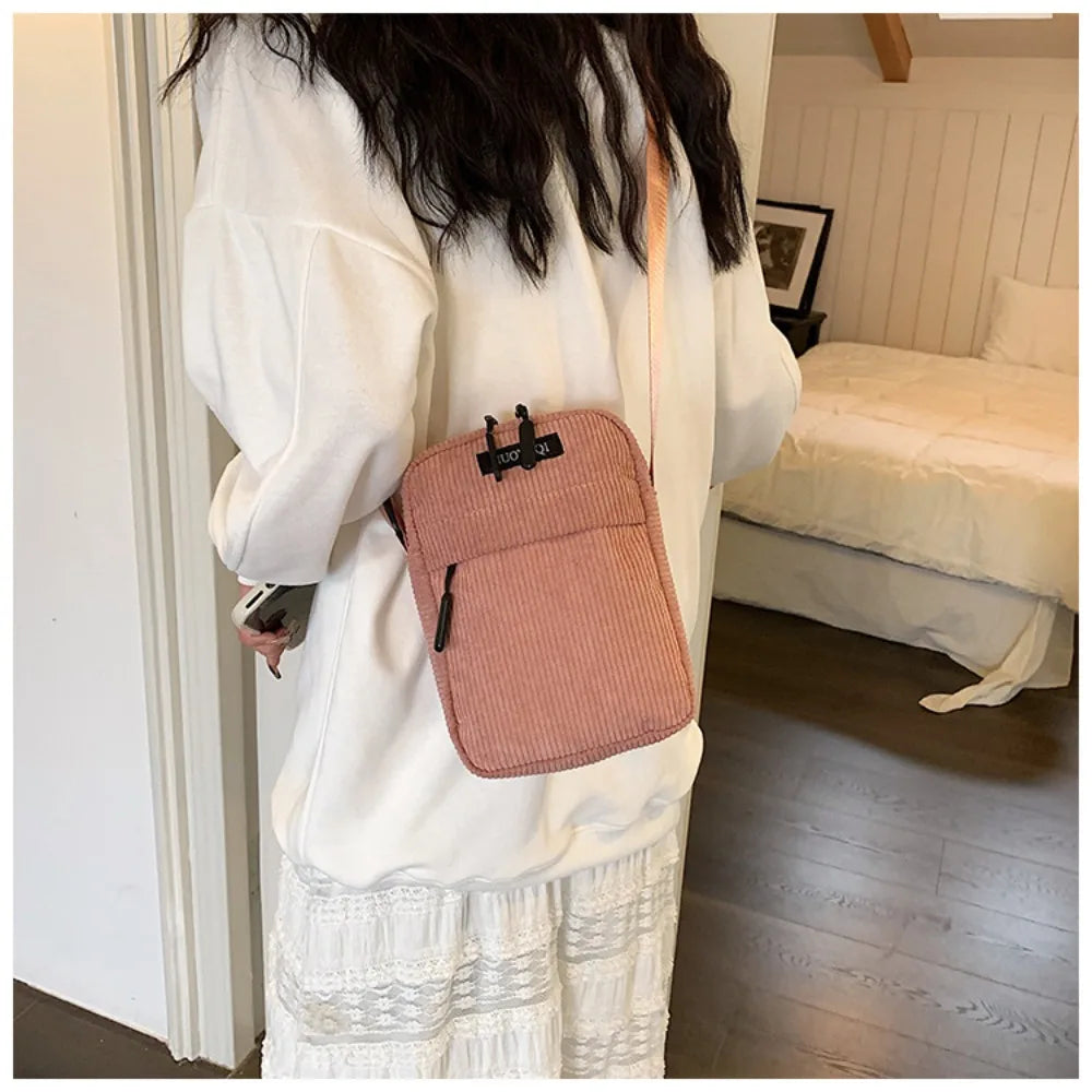 Compact corduroy crossbody bag