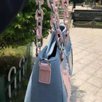 Denim handbag with star patches