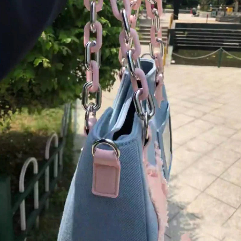 Denim handbag with star patches