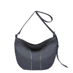 Soft washed denim shoulder bag with casual fold design