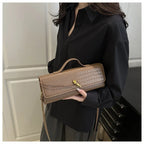 Compact leather handbag