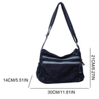 Classic denim shoulder handbag with zipper closure