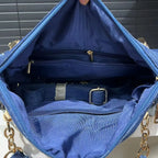 Elegant floral embroidered denim handbag with chain handle